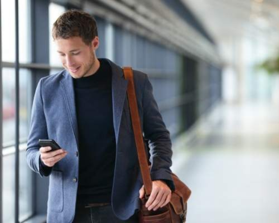 Business traveler holding a smartphone in an airport while receiving an email from a Corporate Stays agent with arrival details, related to what is bleisure travel. Business traveler holding a smartphone in an airport while receiving an email from a Corporate Stays agent with arrival details, related to what is bleisure travel. Business traveler holding a smartphone in an airport while receiving an email from a Corporate Stays agent with arrival details, related to what is bleisure travel. Business traveler holding a smartphone in an airport while receiving an email from a Corporate Stays agent with arrival details, related to what is bleisure travel. Business traveler holding a smartphone in an airport while receiving an email from a Corporate Stays agent with arrival details, related to what is bleisure travel. Business traveler holding a smartphone in an airport while receiving an email from a Corporate Stays agent with arrival details, related to what is bleisure travel. Business traveler holding a smartphone in an airport while receiving an email from a Corporate Stays agent with arrival details, related to what is bleisure travel. Business traveler holding a smartphone in an airport while receiving an email from a Corporate Stays agent with arrival details, related to what is bleisure travel. Business traveler holding a smartphone in an airport while receiving an email from a Corporate Stays agent with arrival details, related to what is bleisure travel.